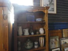 Waxed pine open bookcase on plinth