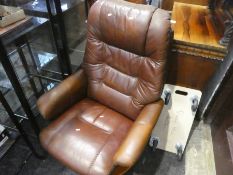 Contemporary stress less style brown leather armchair and matching footstool