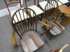 Pair of Ercol elm hoop and stick back armchairs