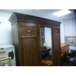 Edwardian compactum wardrobe by Maple and Co, with fitted interior