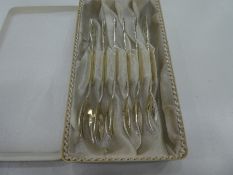 A set of six continental silver forks marked 800, with foliate ornate handle decoration. Total weigh