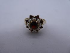 9ct yellow gold garnet and seed pearl cluster ring, size O, marked 375, 2.3g