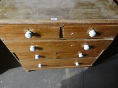 Stripped pined chest of 2 short above 3 long drawers