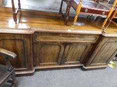 Victorian mahogany mirrored back sideboard of large proportions, with 4 cupboards and central drawer