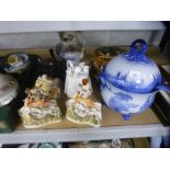 A pair of 19th century Staffordshire figures, novelty tea pots, Majolica style, a cake cover and a b