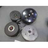 Of fishing interest; a Marvel allcocks fishing reel, a Glacia Mitchell 710 reel and two others