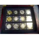Boxed set 12 Silver and gold plated 'Millionaires Collection' coins