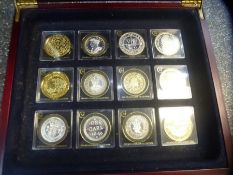 Boxed set 12 Silver and gold plated 'Millionaires Collection' coins