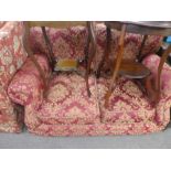 A pair Victorian style modern two seat sofa upholstered in red fabric with gold floral decoration