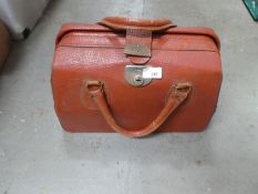 A vintage red leather Cheney handbag