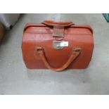 A vintage red leather Cheney handbag