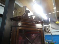 A Victorian in laid corner mahogany cabinet with glazed top above cupboard