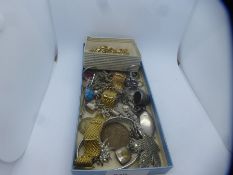 A collection of silver an other costume jewellery to include a charm bracelet, silver thimble with R