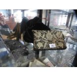 A vintage ladies embellished clutch bag and three hats