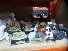 A collection of model animals to include Wedgwood Hedgehog, Staffordshire Dogs, A Beswick model of