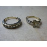 9ct yellow gold pale sapphire set ring and a similar eternity example, both size O, marked 375, gros
