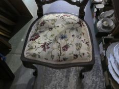 Pair of Edwardian inlaid occasional chairs with tapestry seats on cabriole supports