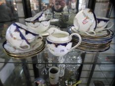 A collection of pretty 19th century floral decorated tea ware