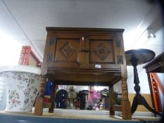 A washstand, two small wooden tables and shades