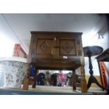 A washstand, two small wooden tables and shades