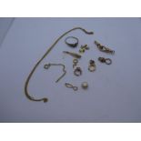 Collection of 9ct yellow gold scrap jewellery, incl. broken ring, clasps, earring, neck chain etc 11