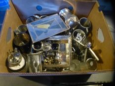 A box of mainly silver plated ware to include tankards, cruet set, jugs etc and a vintage cased SIRR