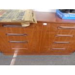 A mid centruy teak bank of eight drawers by G plan