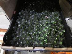 A crate containing a large quantity of marbles