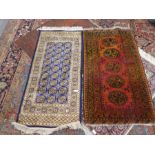 Oriental blue ground silk payer mat 57x26inch  and a middle eastern geometric design carpet 54 x 29i