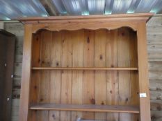 Pine dresser with 3 shelves and two drawers over cupboards