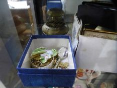 A box of collectables including a birthday book, pen knives, costume jewellery, etc