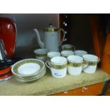 A china coffee set for six having floral gilt rim