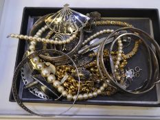 A collection of silver and other costume jewellery comprising a white metal snake bangle, Indian bro