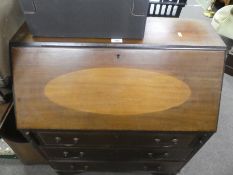 A mahogany inlaid bureau and a mahogany gateleg kitchen table
