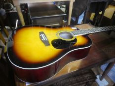 An East coast acoustic guitar in carry case