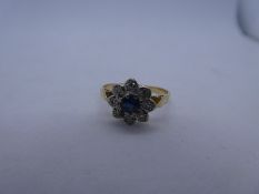 18ct yellow gold sapphire and diamond flower head design cluster ring, marks worn, size O, weight 2.