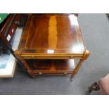 A pair of Yew wood two tier bedside tables