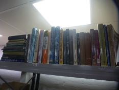 A shelf of various reference books on art and history