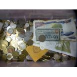 A box of various GB and world coinage and bank notes