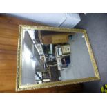 Large gilt framed rectangular bevelled wall mirror