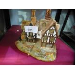 A Royal Albert 14 piece table set, and a boxed Lilliput Lane model cottage 'Ship Inn'
