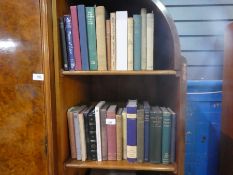 A collection of various vintage books including folio example