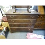 A 18th century pine chest of four graduated drawers