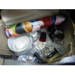 A vintage suitcase containing fabric, a box of vintage wallpaper, Poole pottery, glassware etc