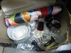 A vintage suitcase containing fabric, a box of vintage wallpaper, Poole pottery, glassware etc