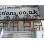 A set of six balloon back dining chairs