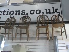 A set of six balloon back dining chairs