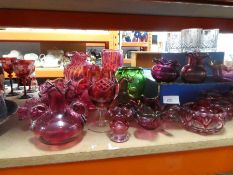 Quantity of mainly red glass vases, glasses etc incl. Dartington