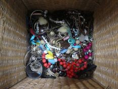 Wicker basket of costume jewellery
