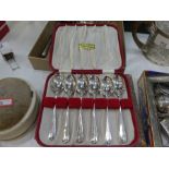 A cased set of six silver teaspoons hallmarked Birmingham 1938 W H Haseler Ltd in a W M Bruford and